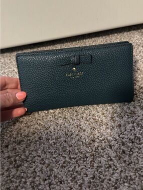 kate spade Pebbled Leather Wallet in Dark Teal with Bow Detail